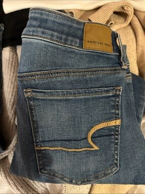 American Eagle Outfitters Jeggings Jeans in Medium Blue with Tan Stitching
